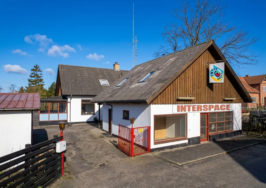 The Interspace building in Skovlunde, Denmark, in 1997, with the company sign over the door and a radio mast on the roof